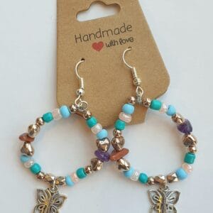 Oorbellen zilverkleurig/ vlinder blauw