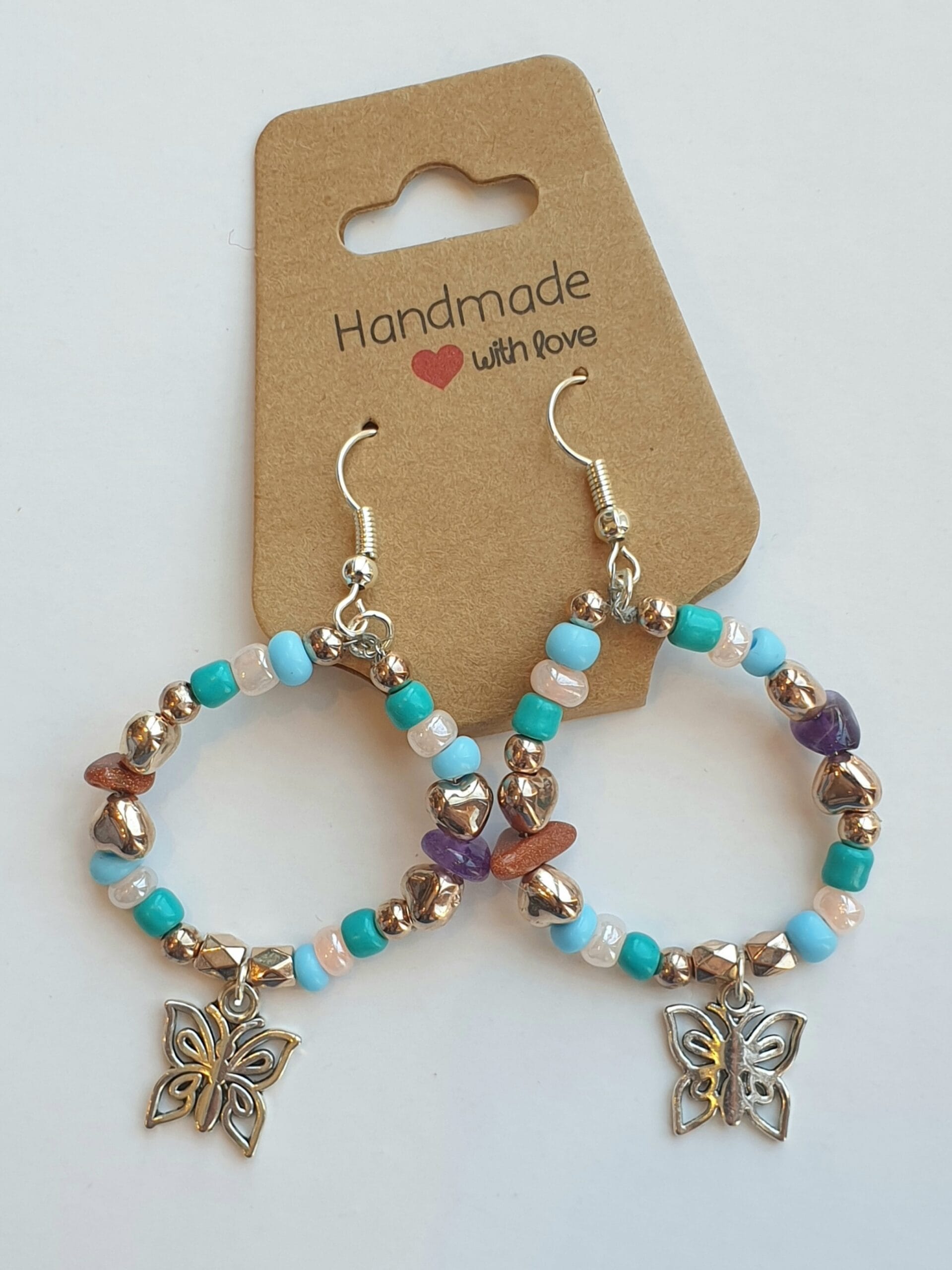 Oorbellen zilverkleurig/ vlinder blauw