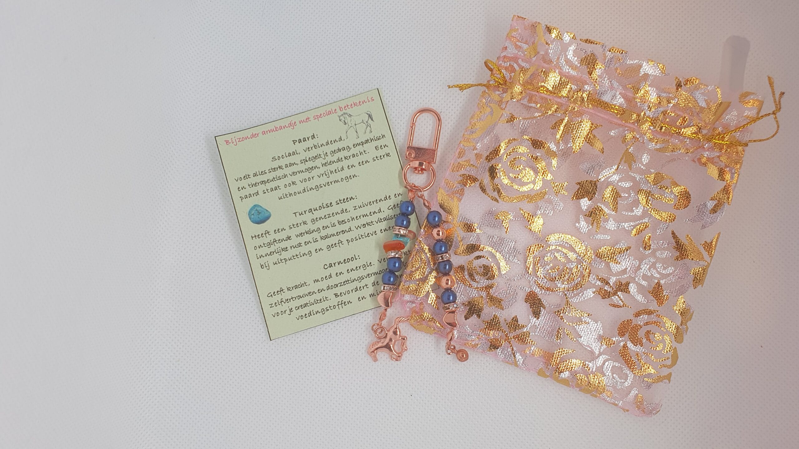 Hoofdstelsieraad paard/Rosékleurig , donkerblauwe parel kralen, rosékleurig paard